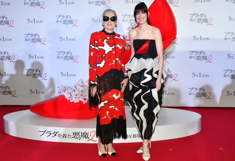 99 The Devil Wears Prada 2 Tokyo Fan Event Anne Hathaway In Black And Ivory Valentino Couture Silk Gown And Meryl Streep In Red And Black Chanel Metiers DArt Fringe Tweed Set